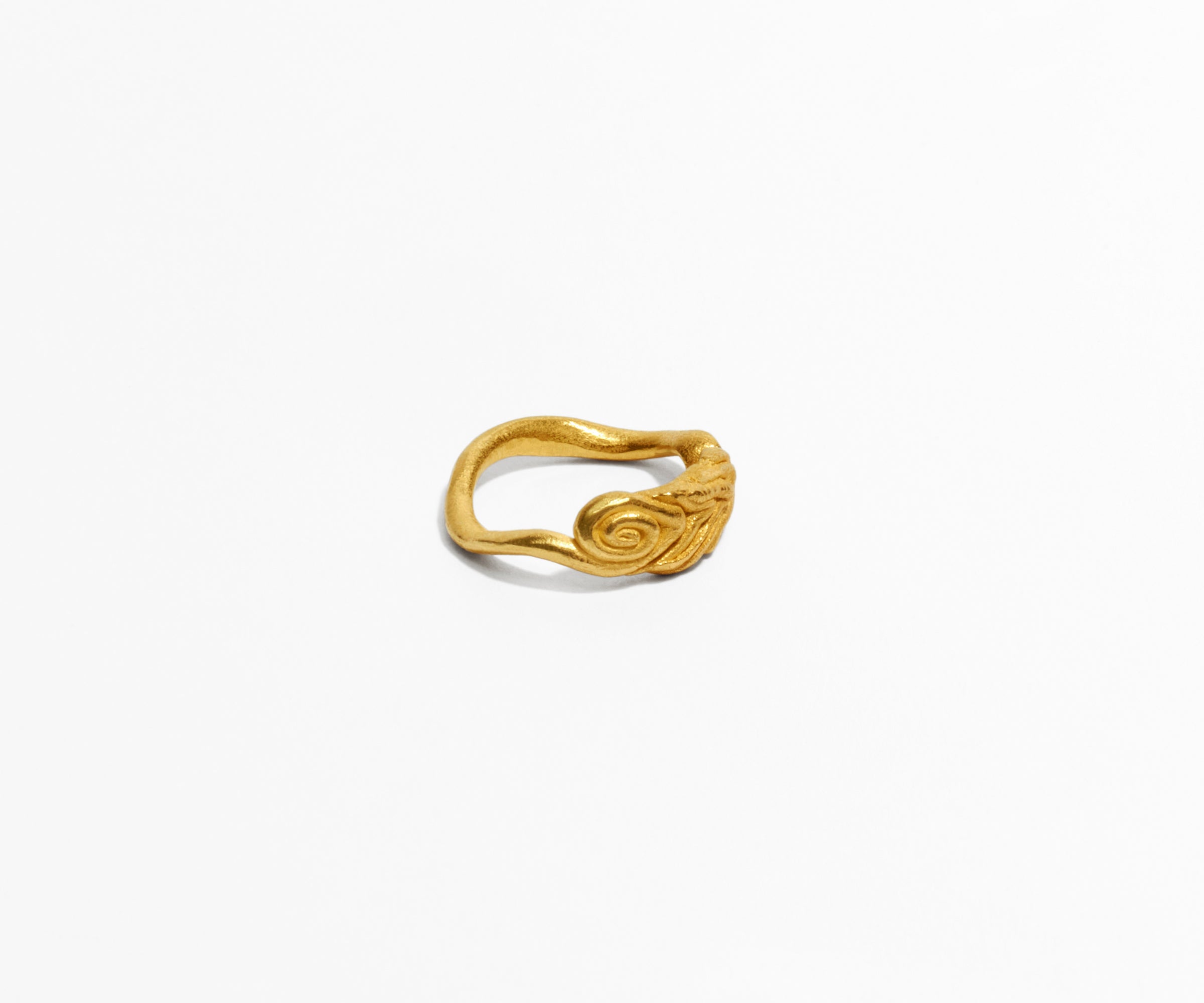 An 18K yellow gold ring shaped organically, inspired by nature.