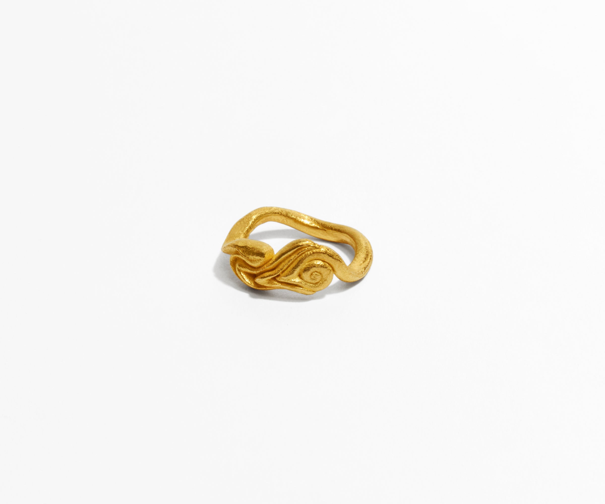 An 18K yellow gold ring shaped organically, inspired by nature.
