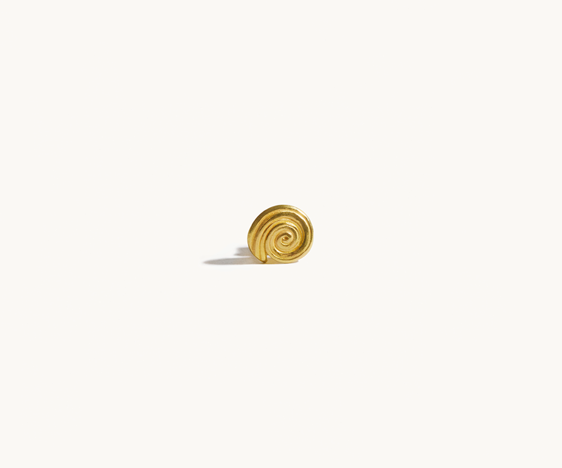 A single spiral-shaped earring made of 18K yellow gold, set against a white background.